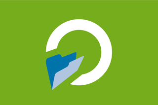 Stilisiertes Icon: Weißer Kreis auf grünem Hinterrund mit blauem Aktendeckel links unten. 