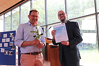 Dr. Johannes Krug (Kirchenkreis Teltow-Zehlendorf) mit dem Rektor Prof. Dr. Sebastian Schroer-Werner